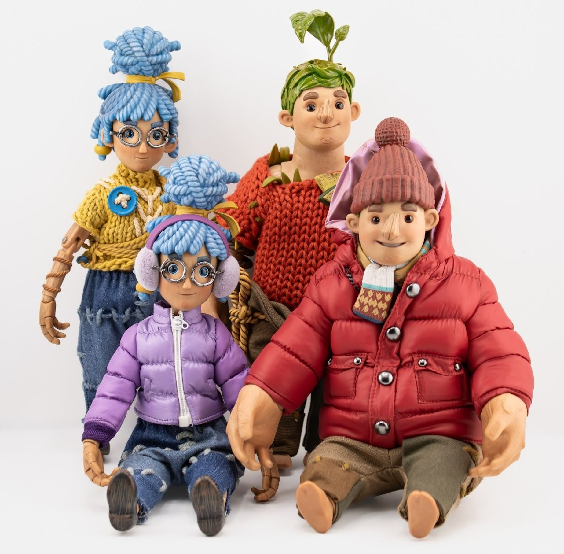 Official It Takes Two Cody and May action figures displayed side by side — part of the Hazelight Collector's Collection, available at the official Hazelight store